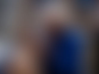 Coach Steve Ridder leads the huddle