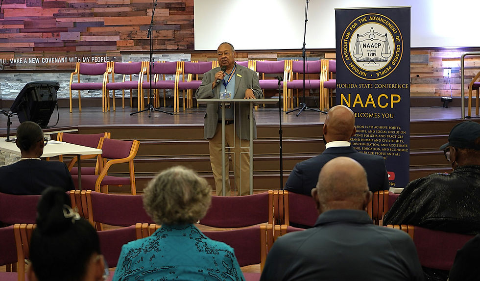 Mr. Leon Russel speaking at the church before the candidate forum.