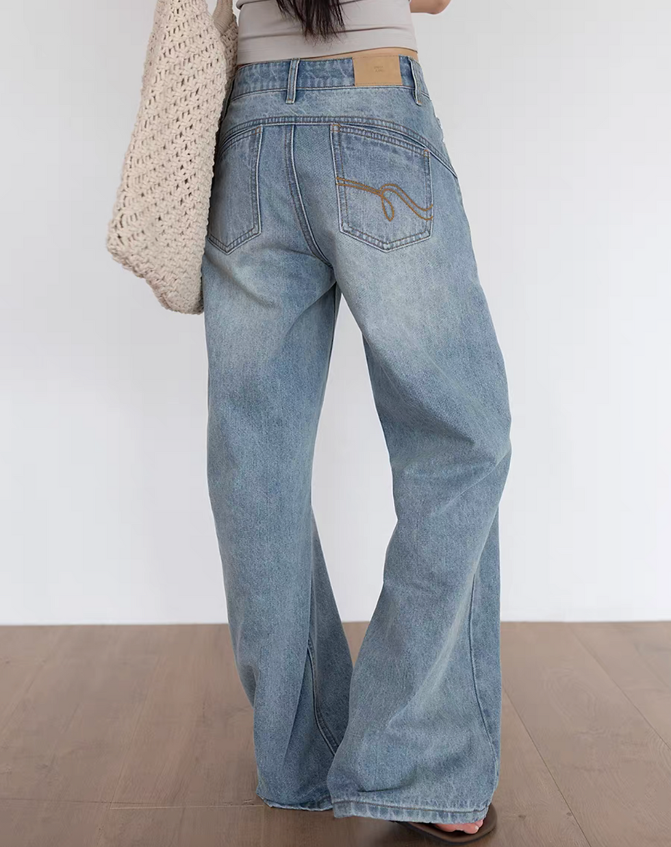 Thumbnail: High waisted acid washed back pocket embroidered denim pants