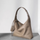 Thumbnail: Toga embossed calf leather drape shoulder + crossbody bag with  little bag charm