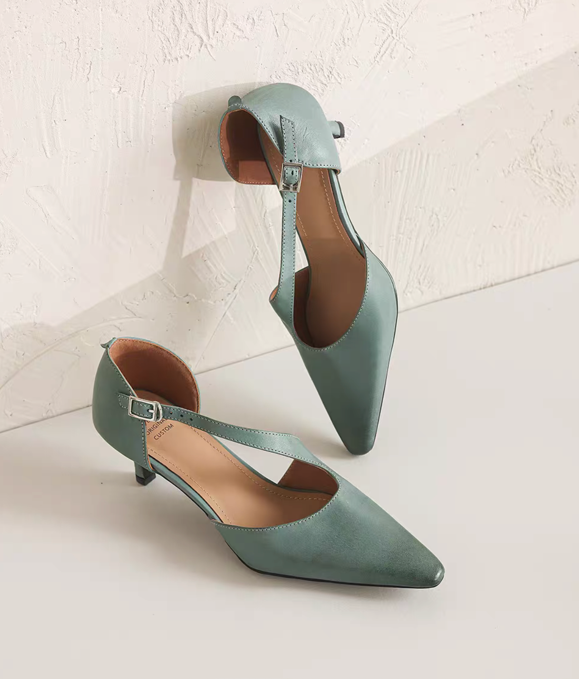 Brushed off smooth calf leather diagonal strap crochet stilettos