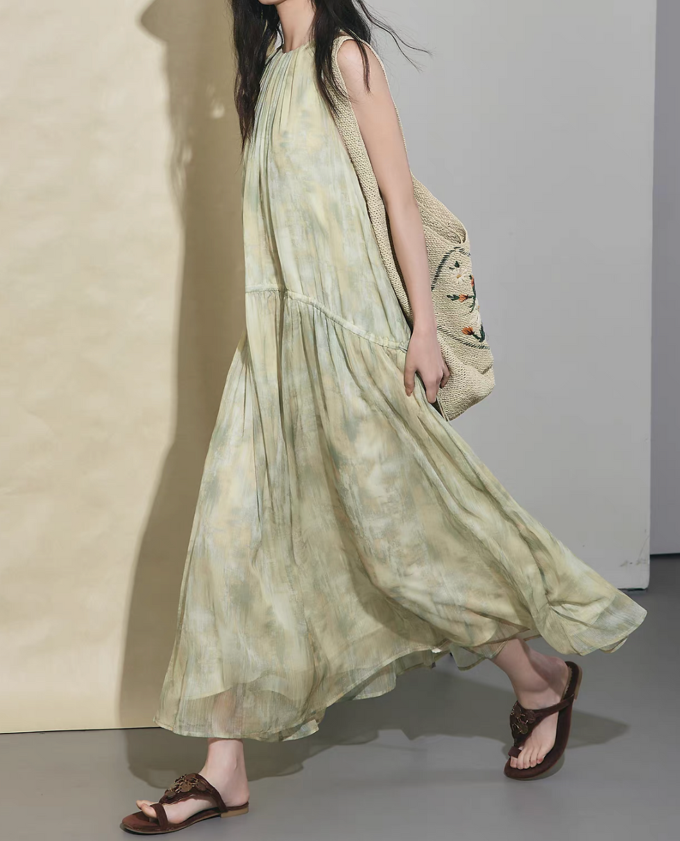Thumbnail: Layered sheer pleated halter botanical patterned pastel green poly maxi dress