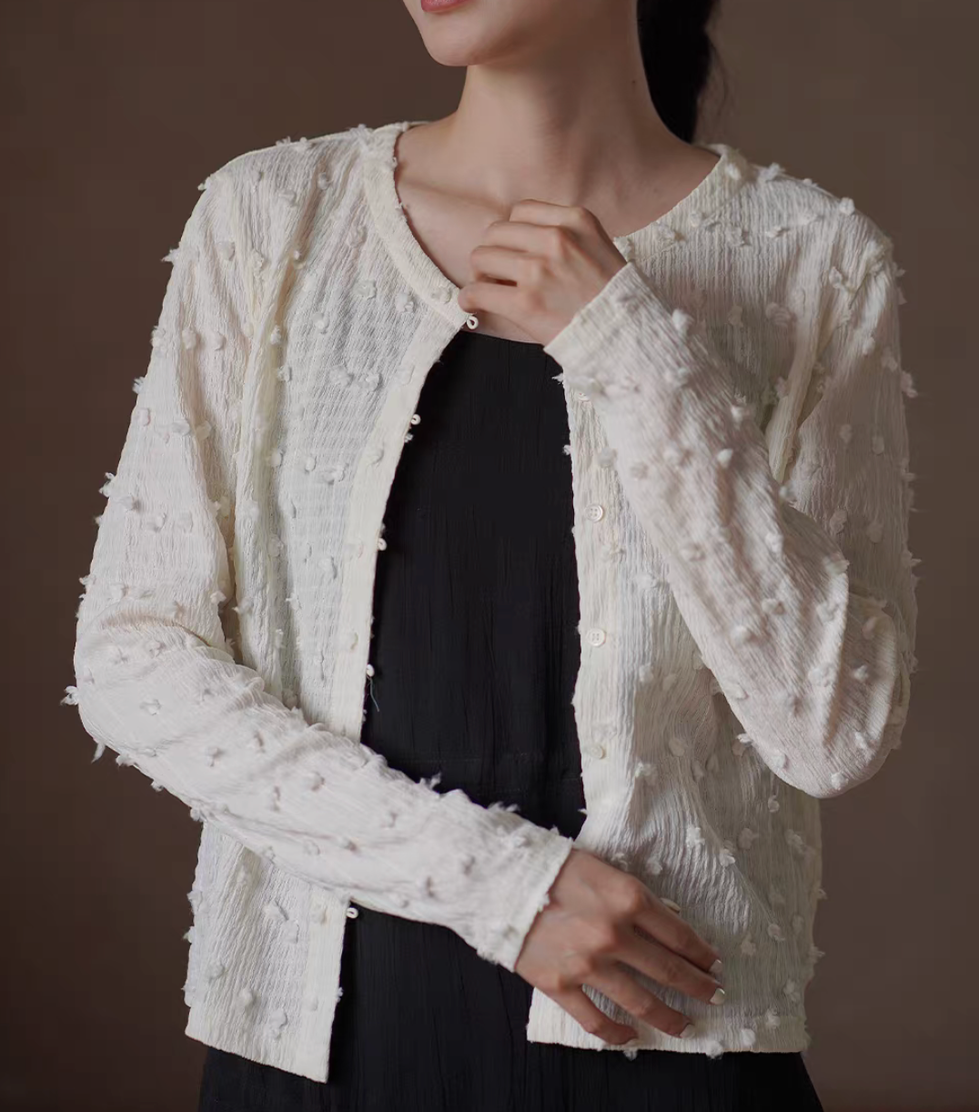 Poly rayon ivory embossed crewneck buttoned cardigan