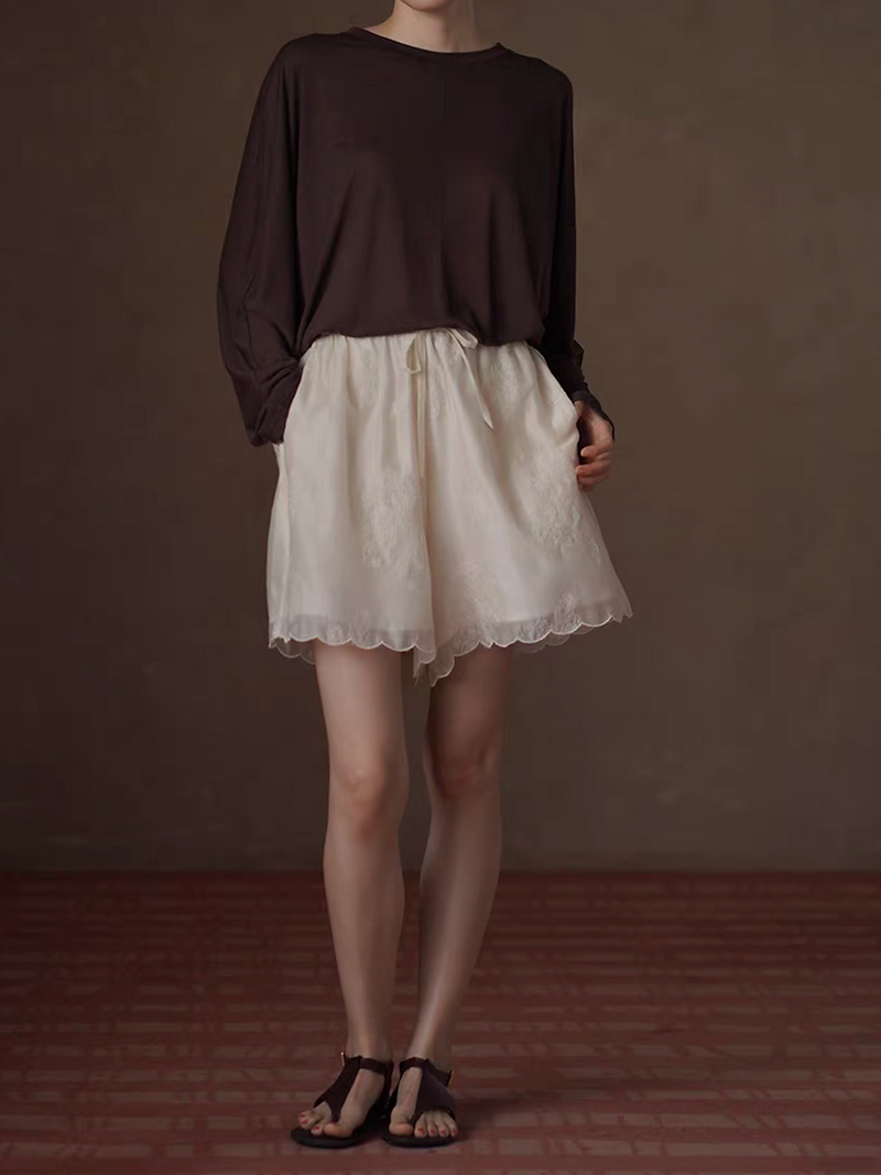 Ivory crochet lined tencel poly elasticated floral shorts 3