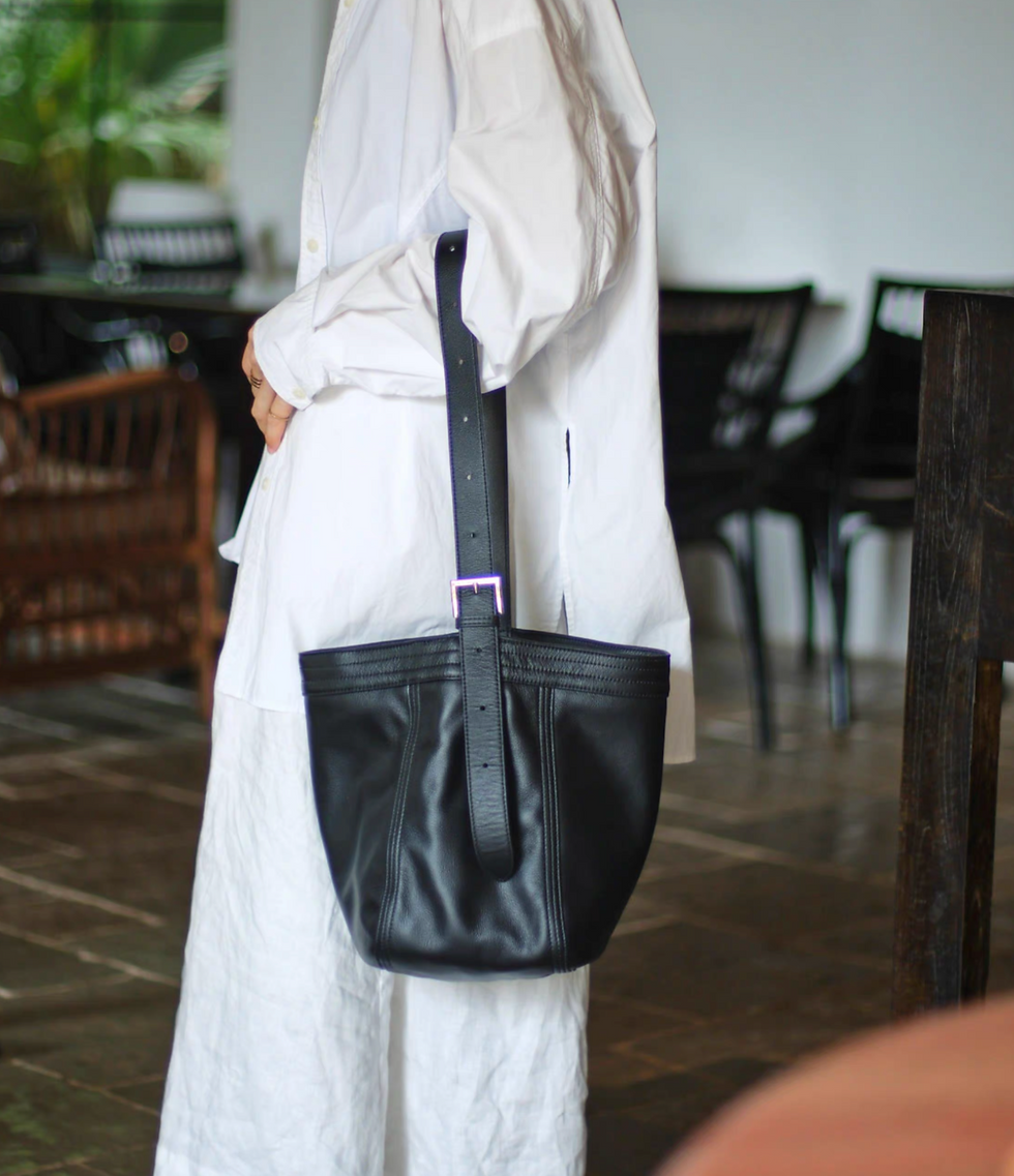 Thumbnail: Adjustable strap contour grain calf leather bucket crossbody + shoulder bag