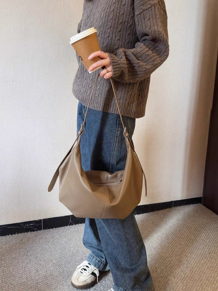 Toga embossed calf leather shoulder + crossbody bowling saddle bag
