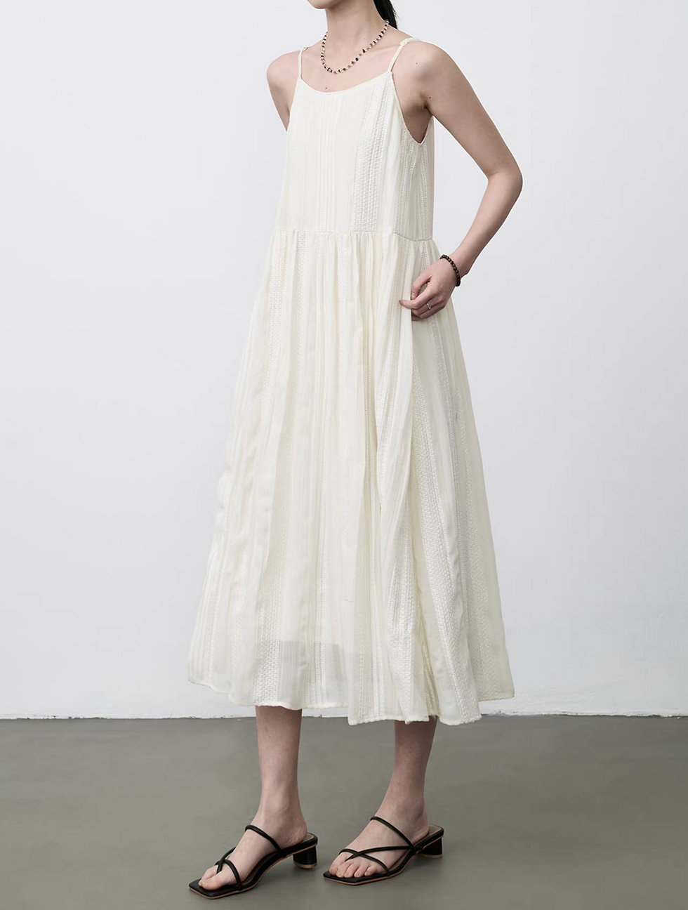 Thumbnail: Ivory embossed floral pleated poly lined slipdress