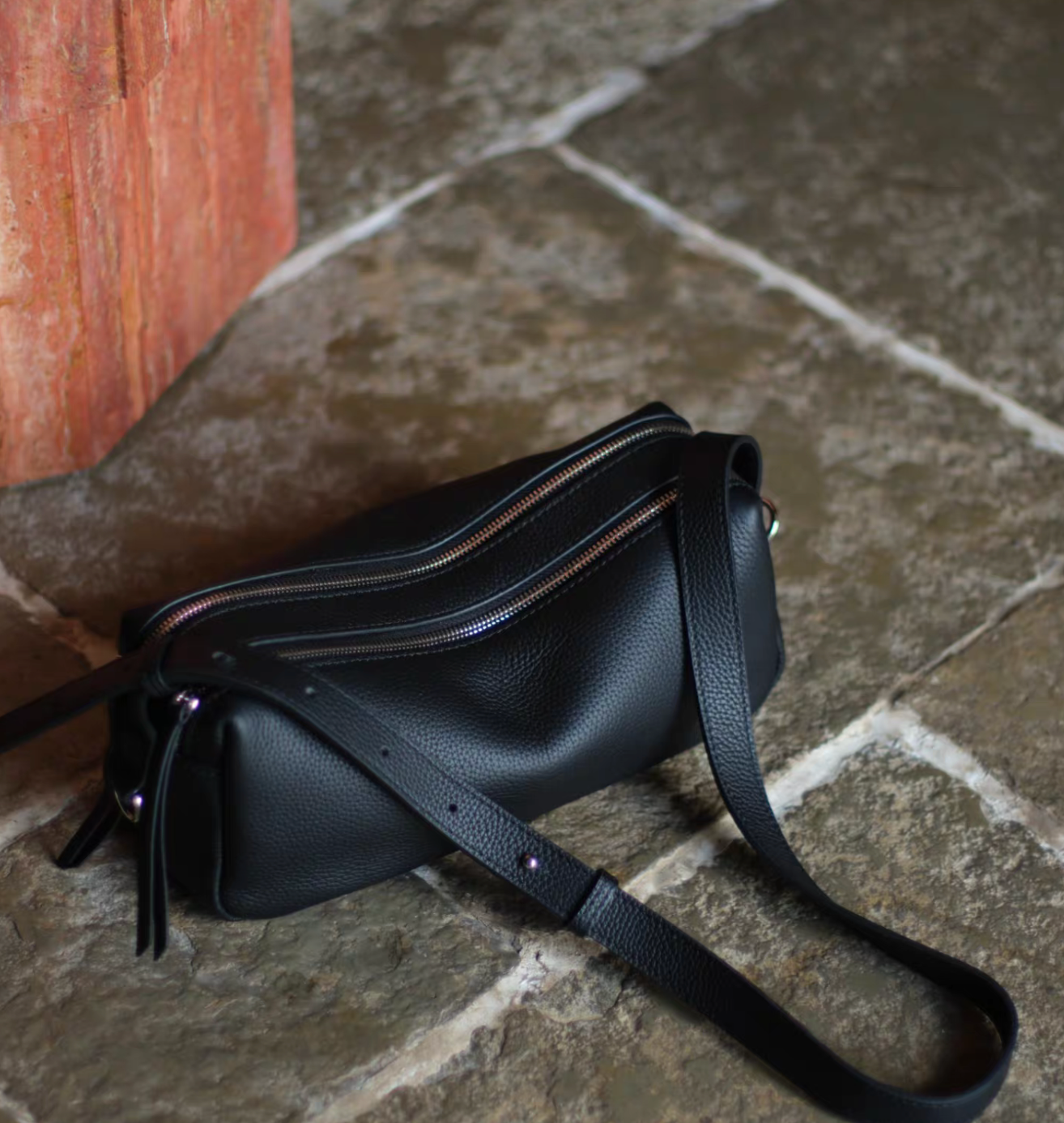 Toga embossed calf leather zipper drape baguette shoulder + crossbody bag