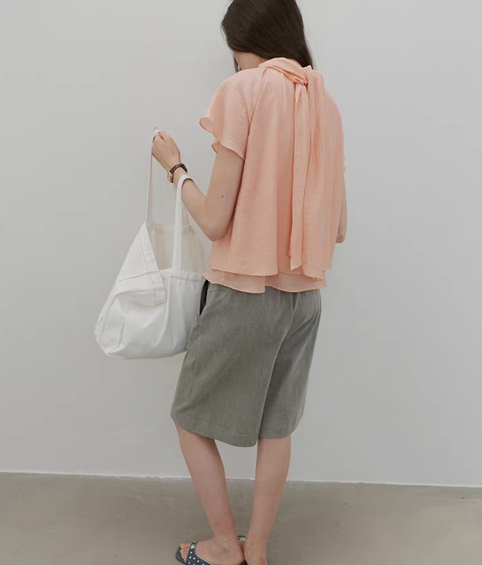 Thumbnail: Apricot pink lyocell rayon pleated back knot layered blouse