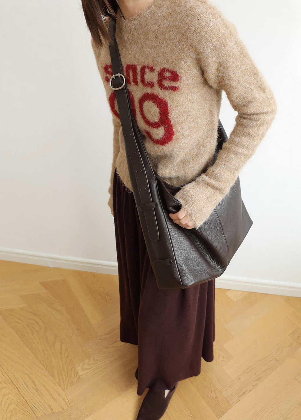 Thumbnail: Toga embossed calf leather side adjusted buckle drape bucket bag