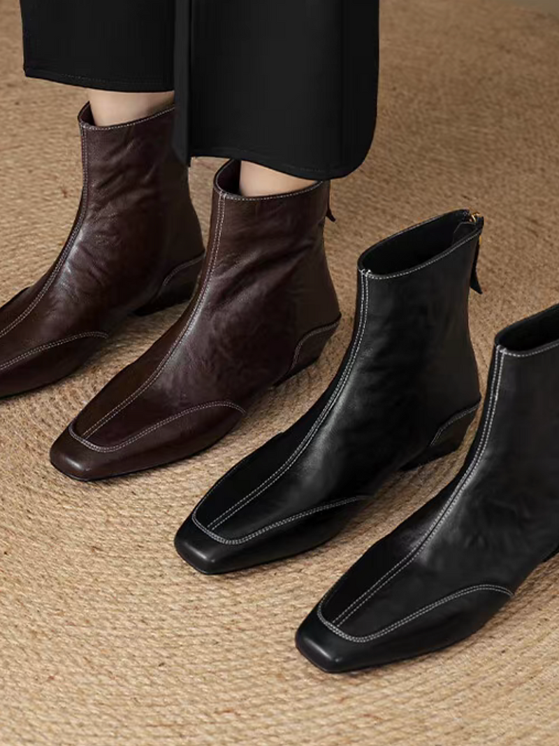 White stitched back zipped ankle boots 11