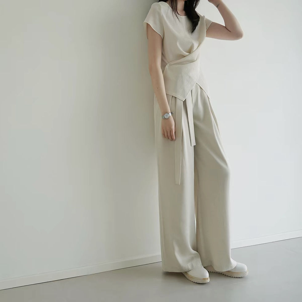 Thumbnail: Ivory belted pleated poly rayon high waisted straight pants