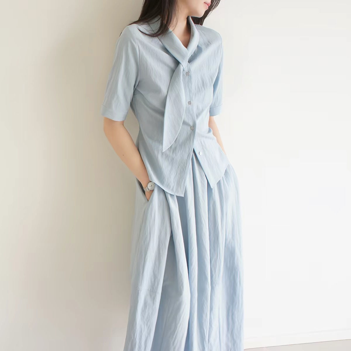 Pastel blue collaratte shell buttoned embossed mid sleeved cotton rayon blouse