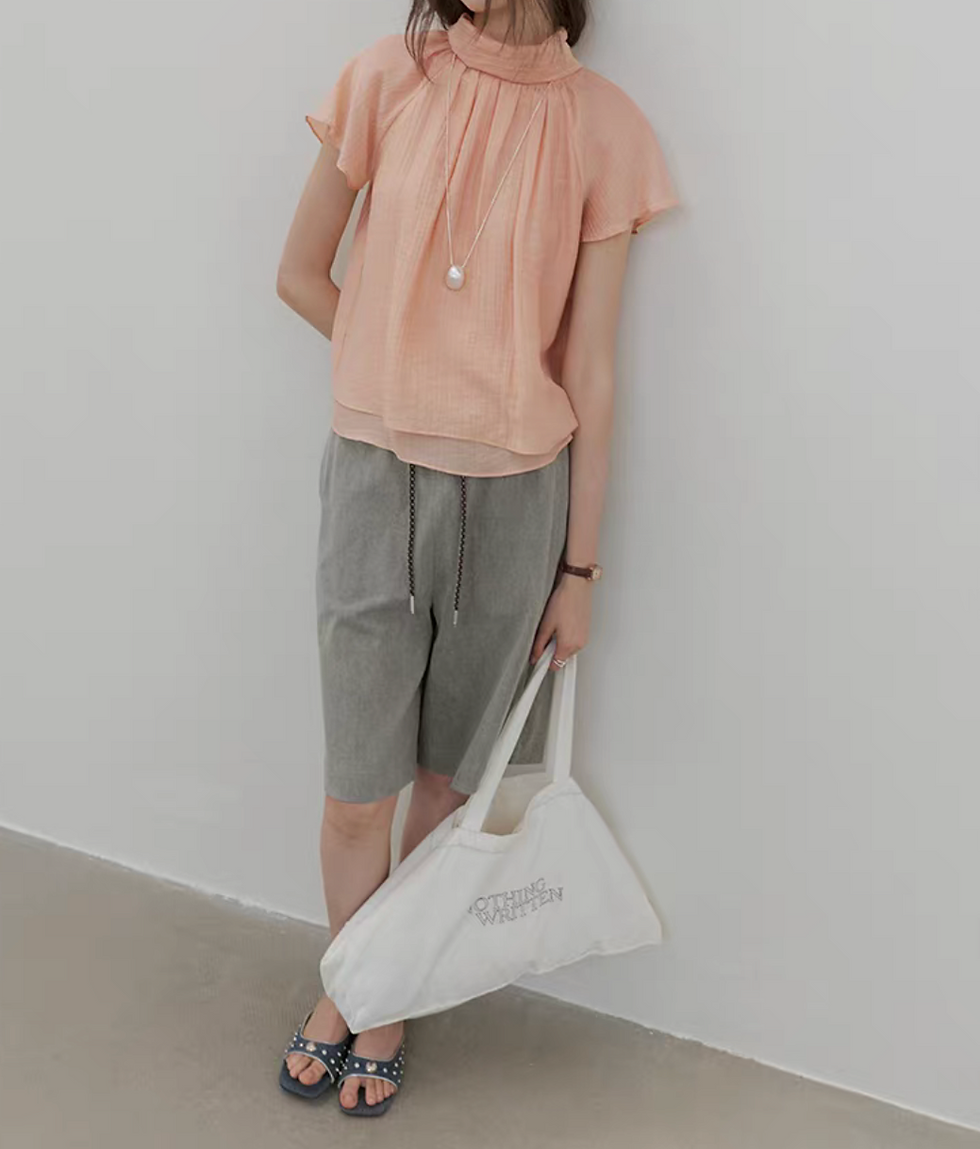 Thumbnail: Apricot pink lyocell rayon pleated back knot layered blouse