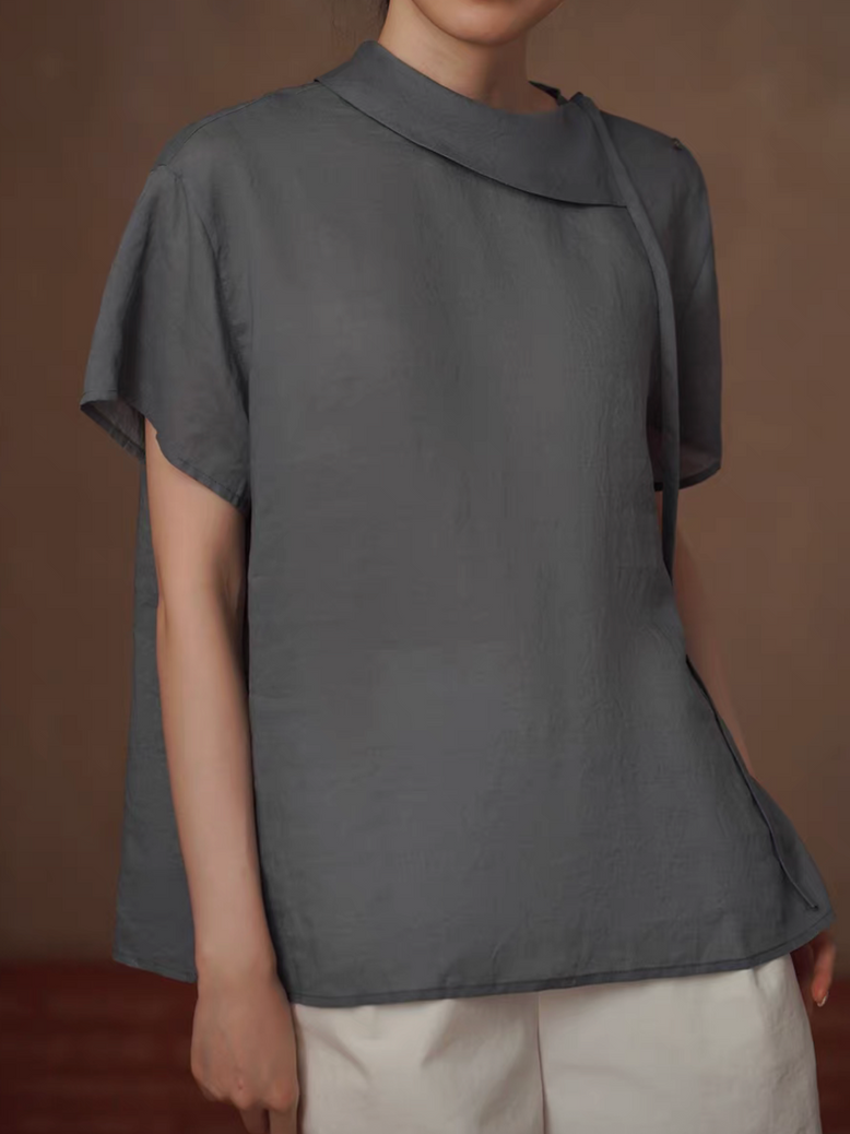 Charcoal asymmetric lyocell tencel poly shoulder knot buttoned sheer blouse 1