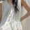 Thumbnail: Floral embossed V neck buttoned sleeveless cotton rayon ivory dress