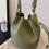 Thumbnail: Toga embossed calf leather bucket shoulder + crossbody bag