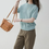 Thumbnail: Pastel blue cotton acrylic knitted shorsleeved top