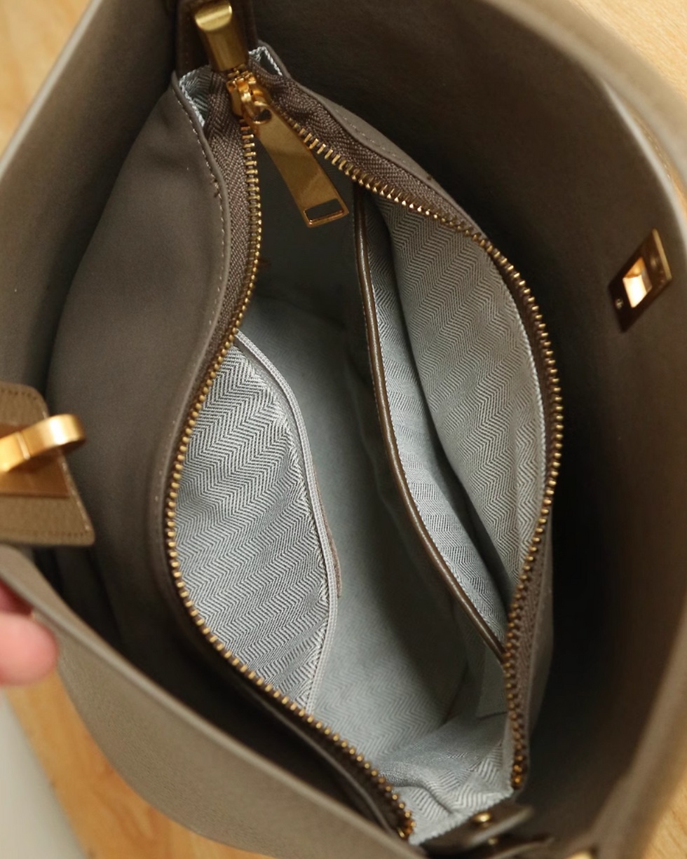 Thumbnail: Toga embossed twisted buckle handle + crossbody bucket bag