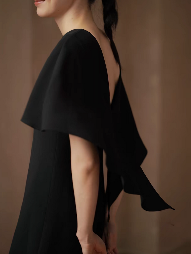 Fluid drape ruffle trim low back shawl connect black poly midi dress 3