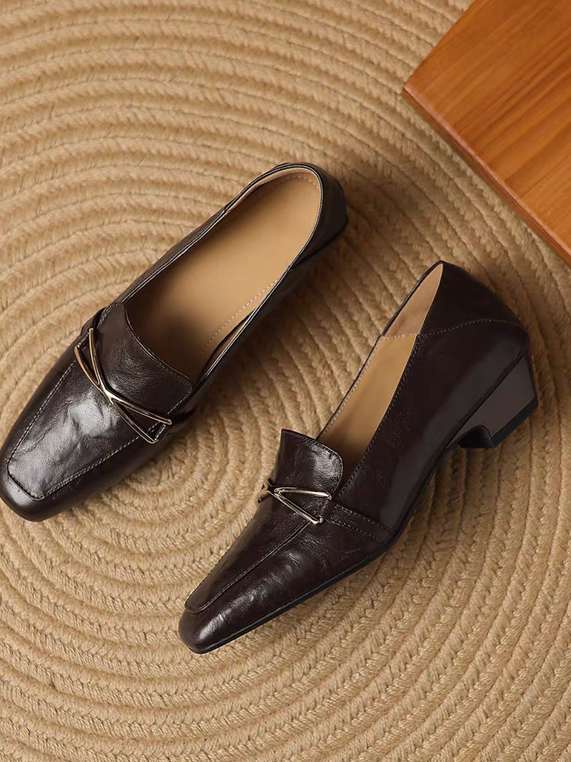 Lambskin metal deco low heel loafers 11