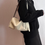 Thumbnail: Toga embossed calf leather drape zipper shoulder + crossbody bag