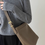 Thumbnail: Togo embossed calf leather contour shoulder + crossbody bucket bag