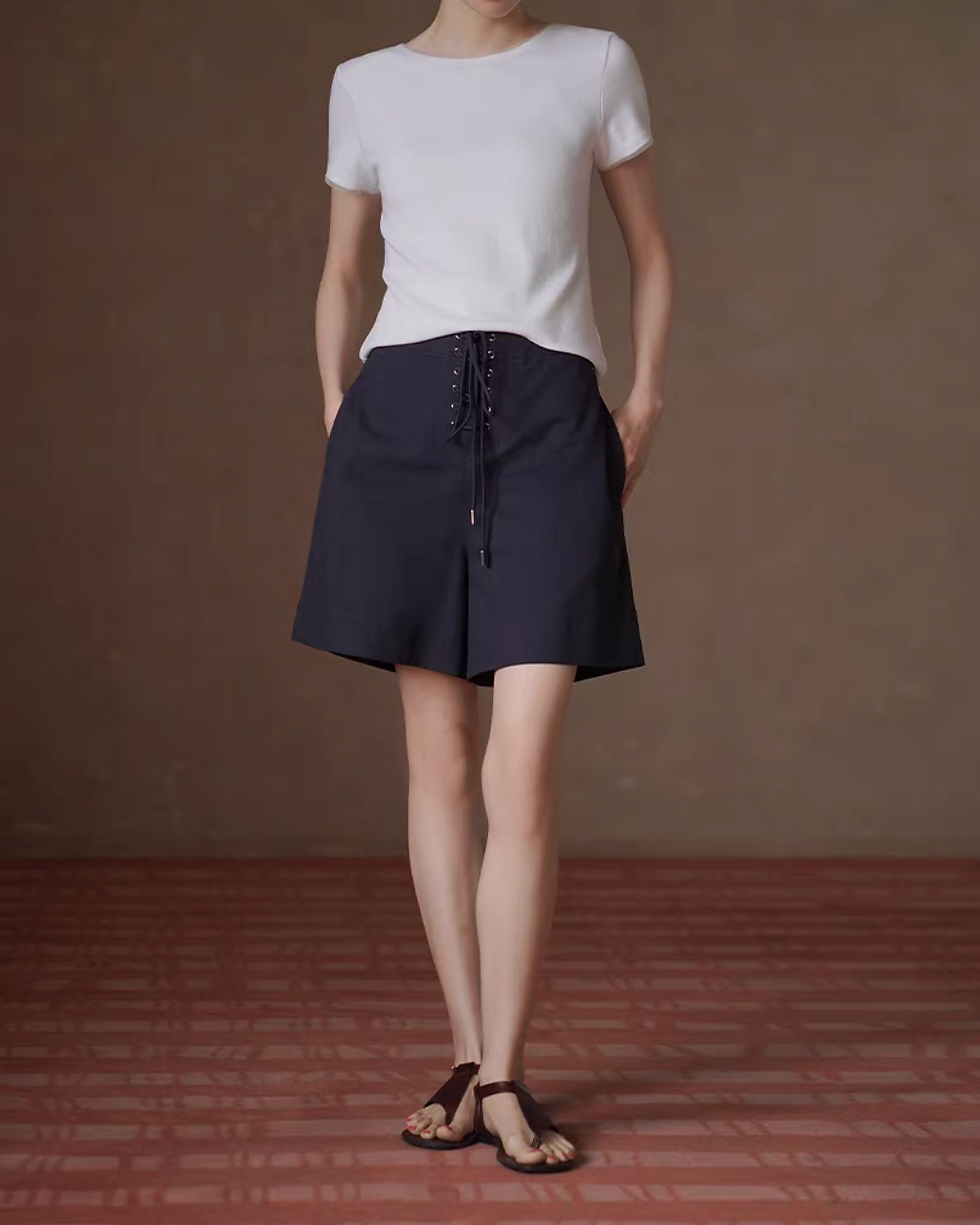 Thumbnail: Navy back elasticated front lacing high waisted cotton shorts