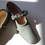 Thumbnail: Made in Paris etoupe grey sheep skin square toe ruffle strap Mary Janes