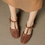 Thumbnail: T strap weaved calf leather sandals