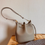 Thumbnail: Toga embossed calf leather bucket shoulder + crossbody bag