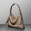 Thumbnail: Toga embossed calf leather drape shoulder + crossbody bag with  little bag charm