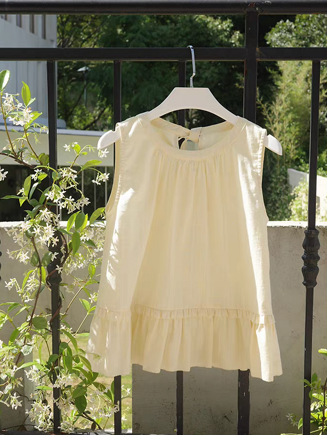 Pastel yellow back knot peplum poly rayon vest 3