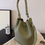 Thumbnail: Toga embossed calf leather bucket shoulder + crossbody bag
