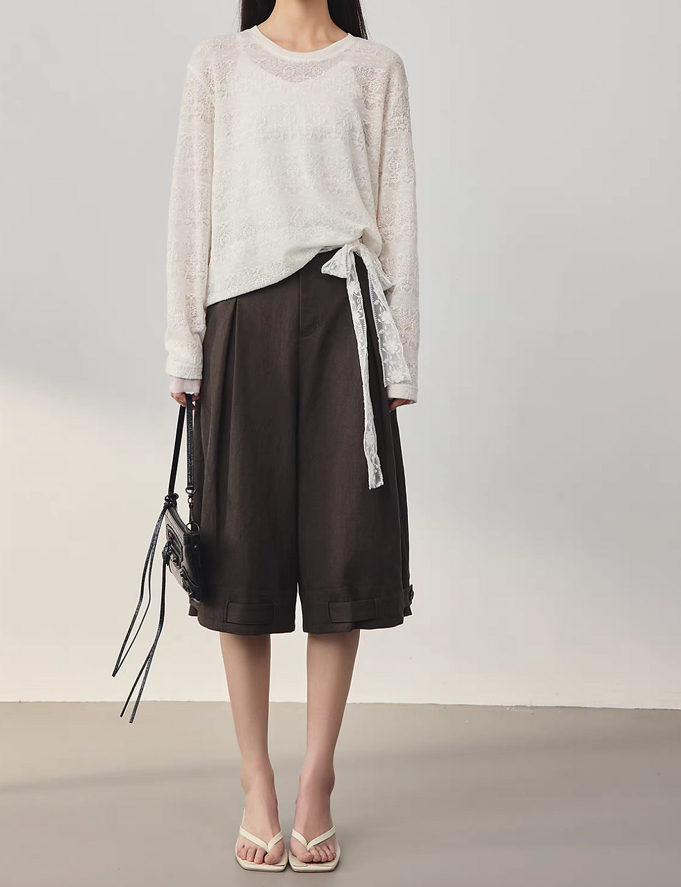 Thumbnail: Mocha brown cotton tencel buttoned strap high waisted pleated shorts