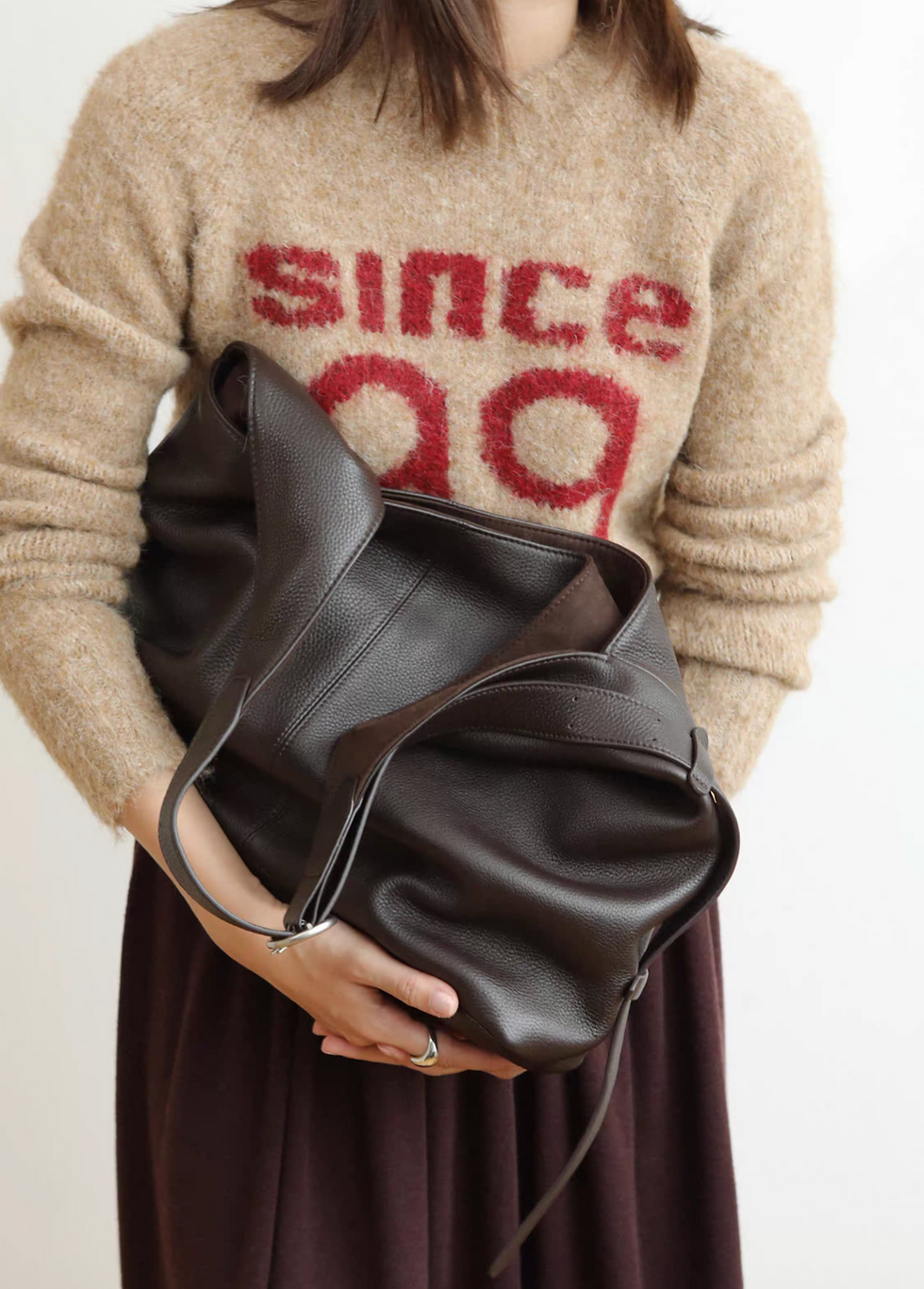 Thumbnail: Toga embossed calf leather side adjusted buckle drape bucket bag