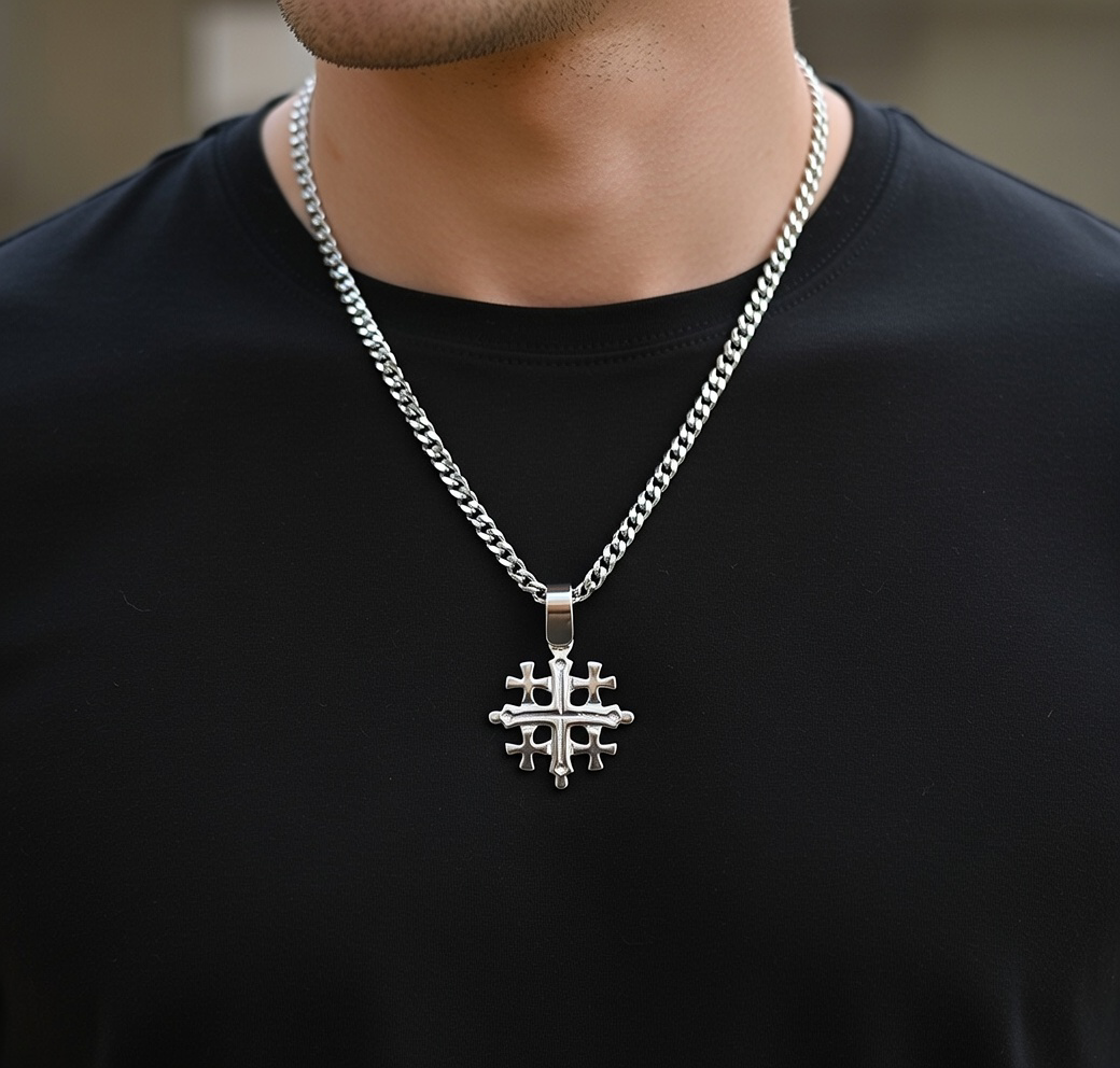Sterling Silver Jerusalem Cross Pendant  on the neck of the model in black t shirt
