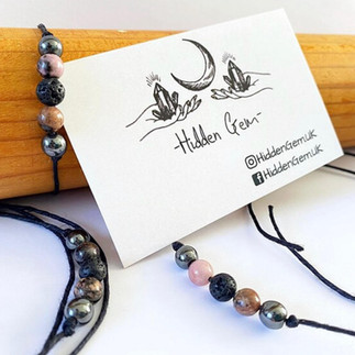 Crystal necklace made up of pink, black and brown small crystal balls. Hidden Gem is a LGBTQ+ Favours & gifts wedding supplier, part of the Rebel Love Directory.