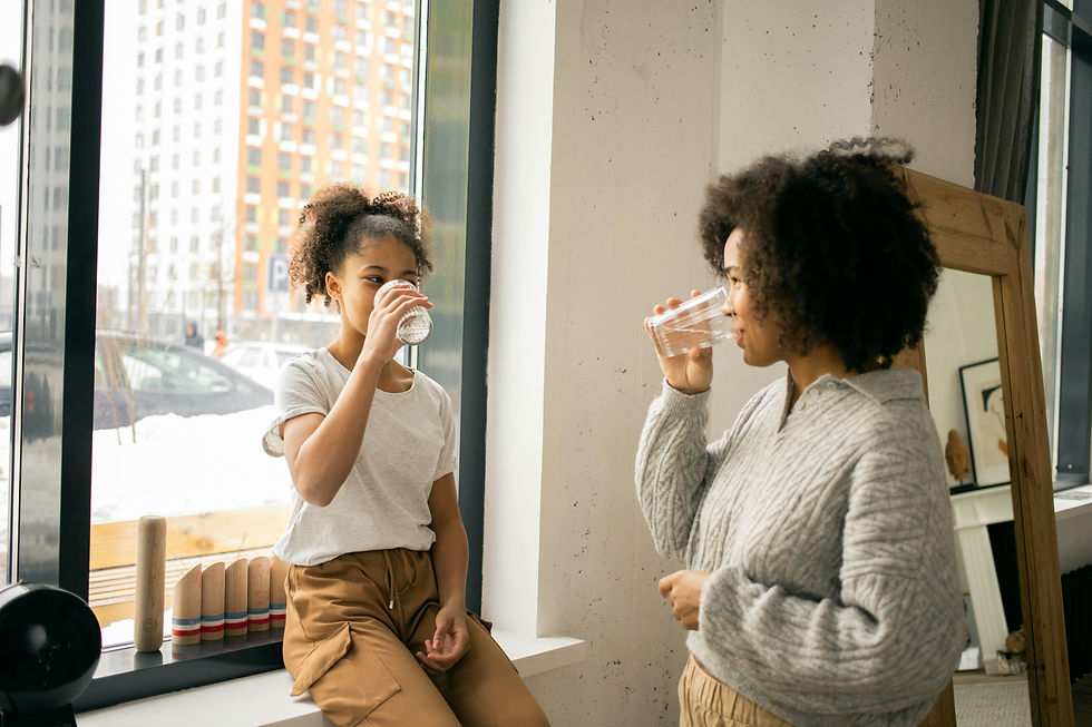 Mother and Daughter Drinking water together