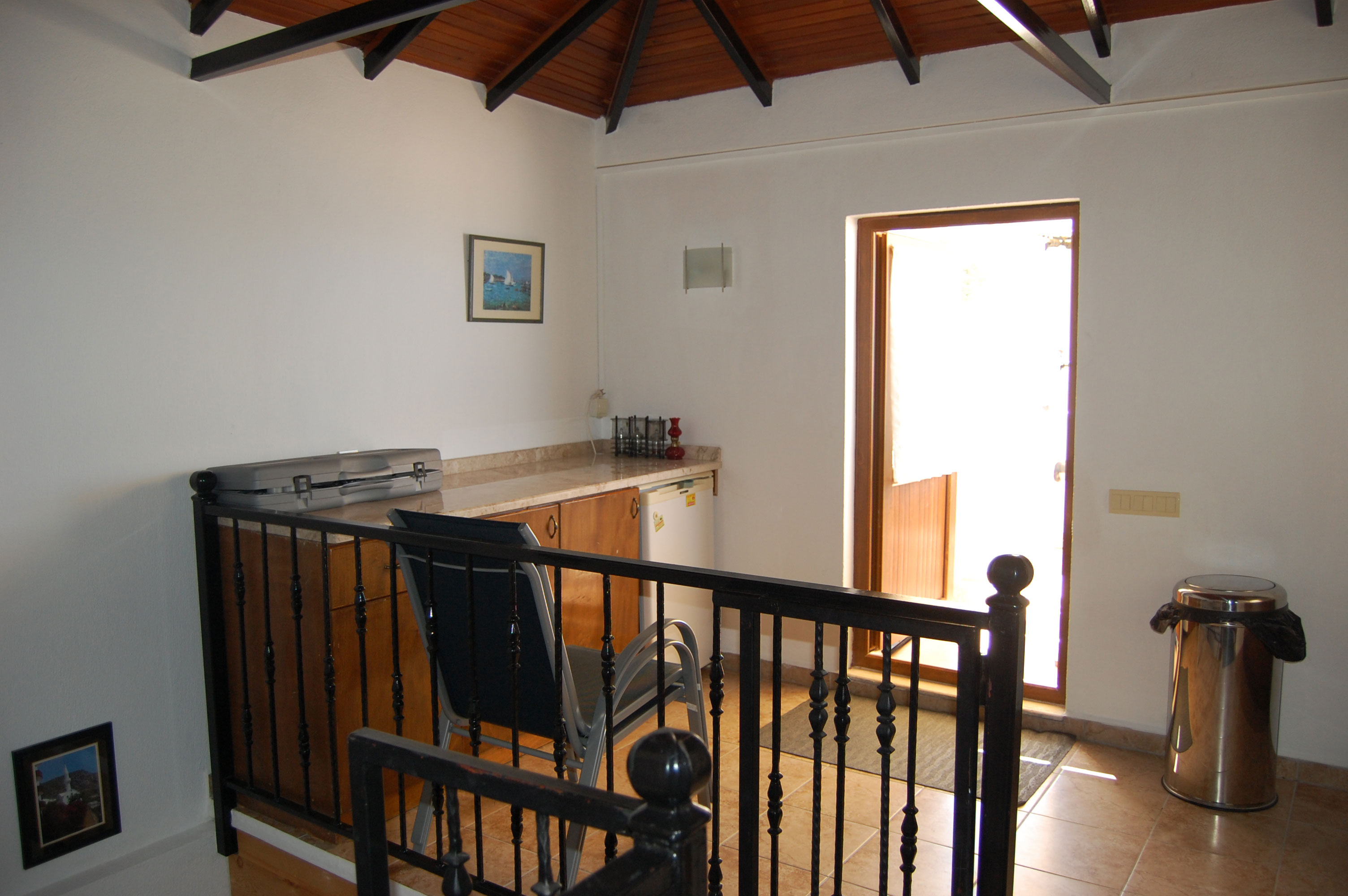 Upstairs kitchen out to roof terrace