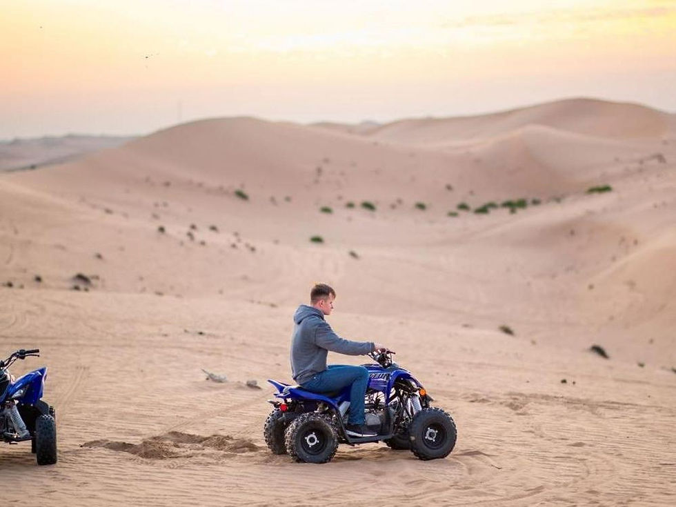 Miniatura: Quad Bike Adventure with Transfers from Abu Dhabi for Two