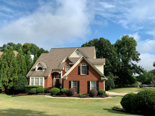 Suburban home with blue skies