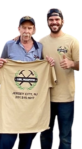 Happy client of UBL Roofing holding tshirt with team.