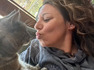 Dr Carone being playful with her uninterested cat