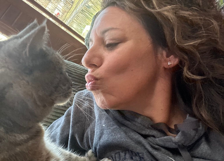 Dr Carone being playful with her uninterested cat