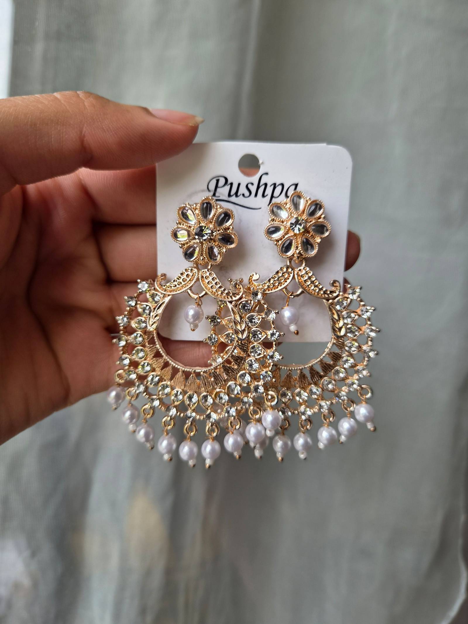 Boucles d'oreilles pendantes dorées