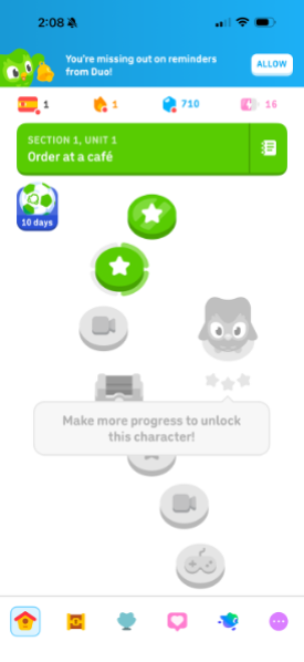 Note. Screenshot taken from the author's Duolingo account showing the Section 1, Unit 1 skill tree with completed levels, locked levels, and a bonus treasure chest