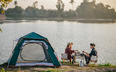 cheerful-young-couples-camping-with-morning-coffee-2025-01-16-15-27-07-utc.jpg