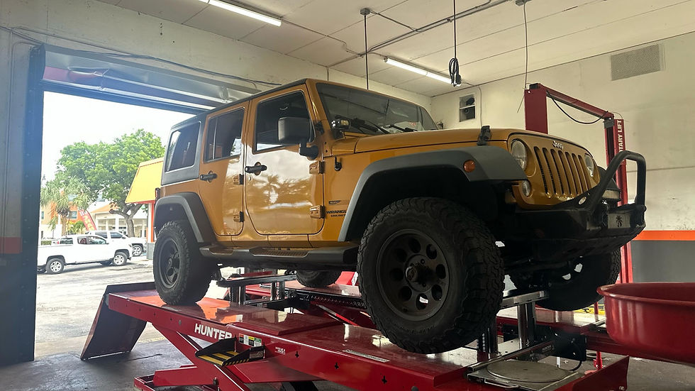 Jeep Wrangler on the alignment rack – Fast Tire & Auto Repair Lantana / West Palm Beach