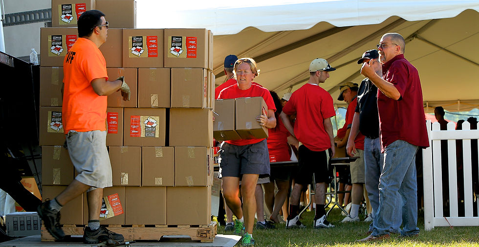 240 volunteers pack 24,000 meals